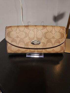 Coach Signature Canvas Continental Wallet - Tan And Orange